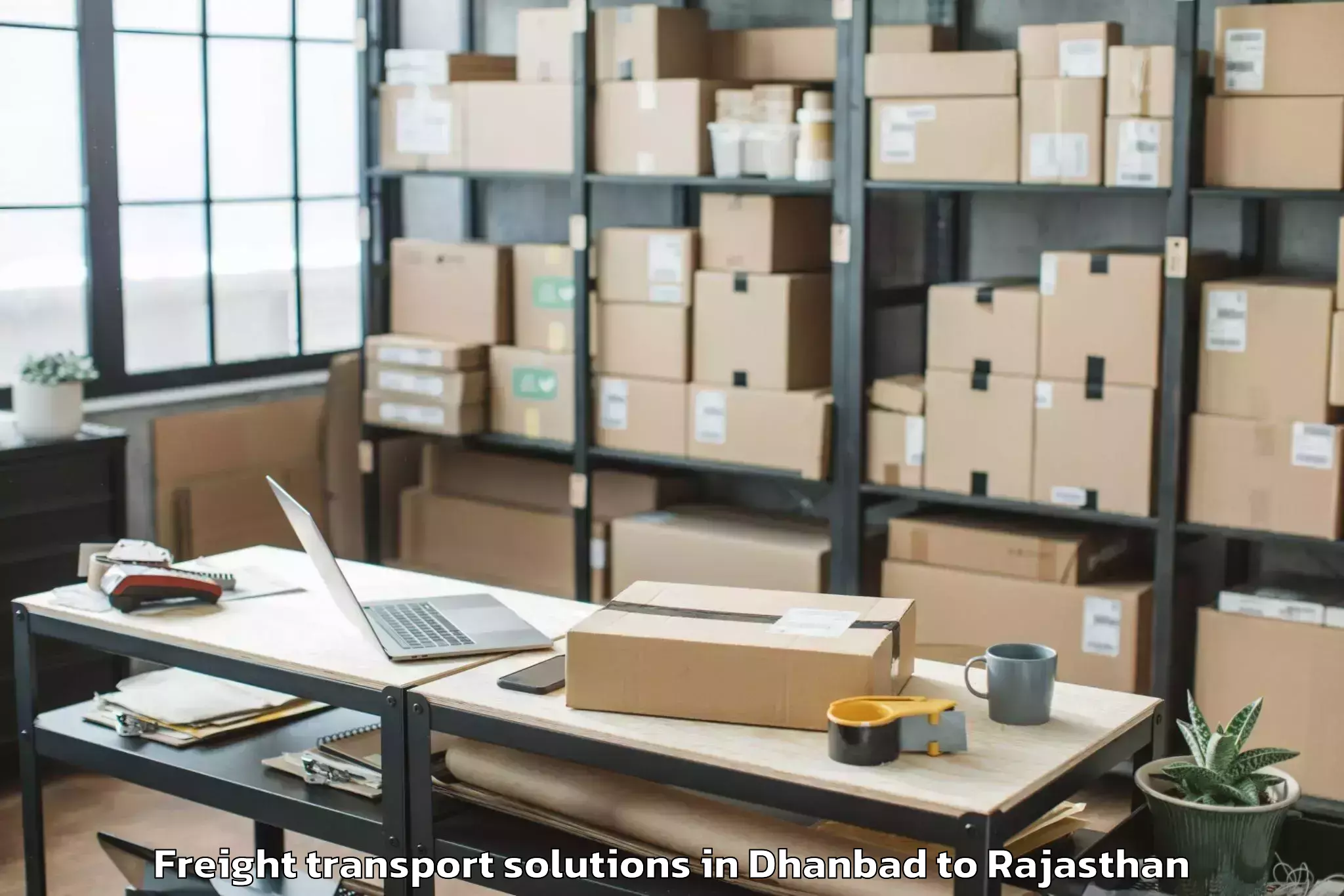 Easy Dhanbad to Baswa Freight Transport Solutions Booking